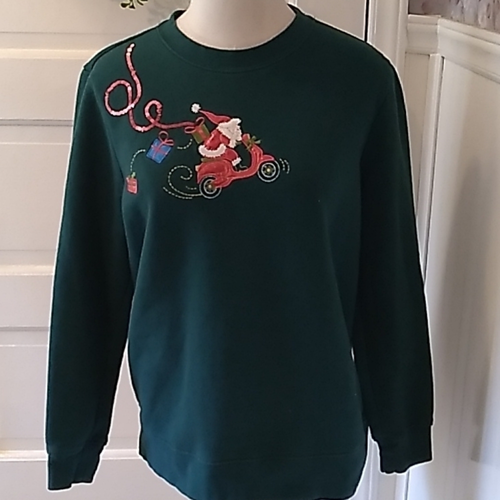 Holiday Editions medium Santa on a scooter sweatshirt Christmas